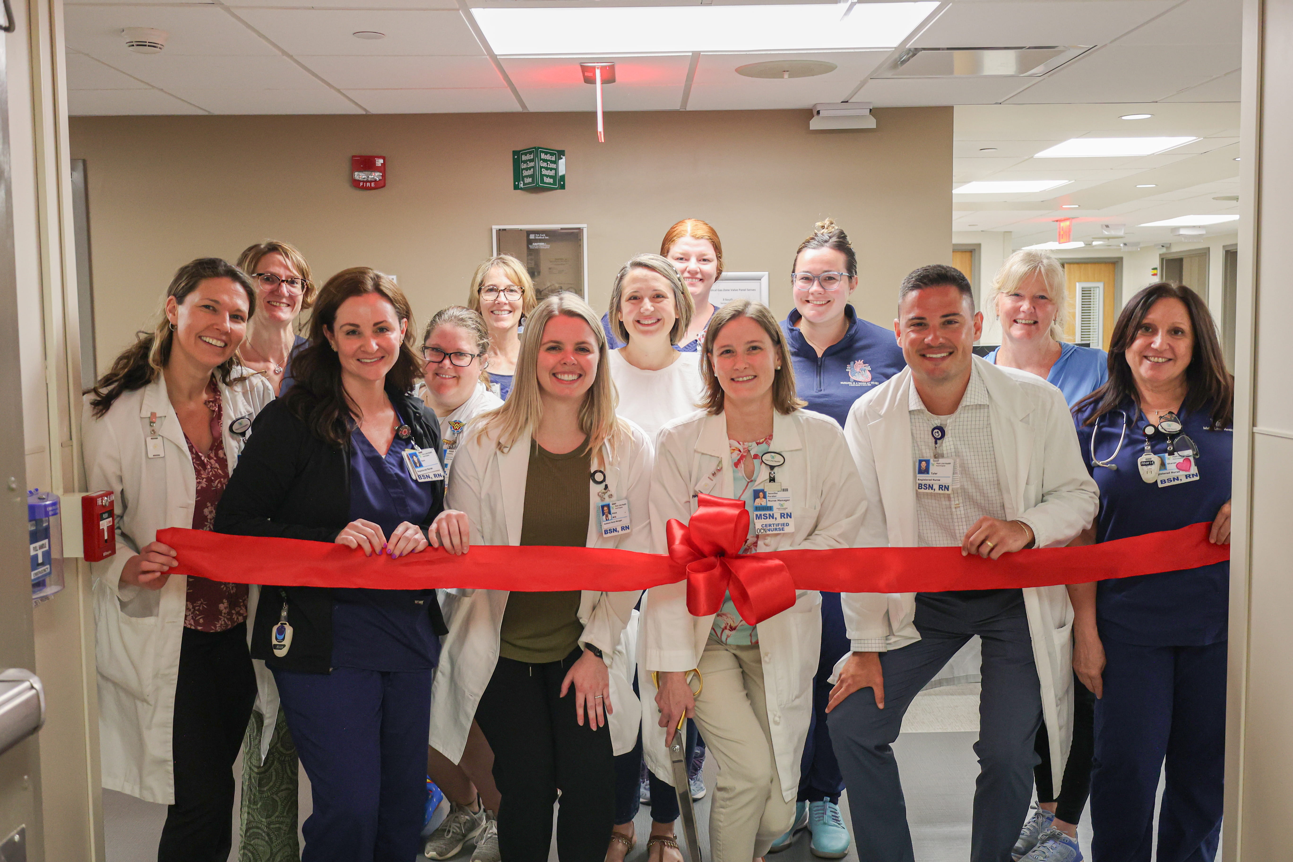 Clinicians gathered for ribbon cutting