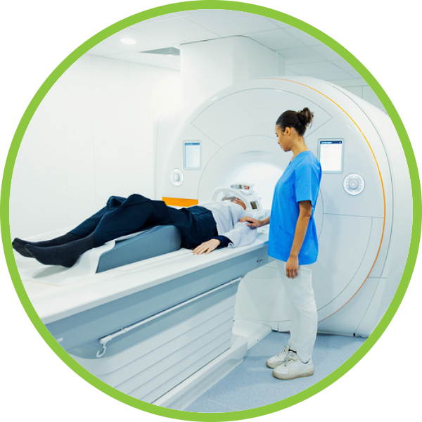 Nurse reassuring patient undergoing MRI scan in hospital